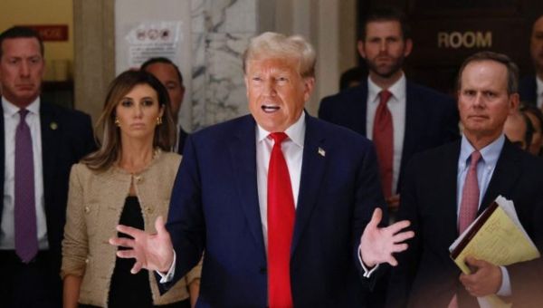 Trump ahead of court appearance: ‘A dark day for our Country’