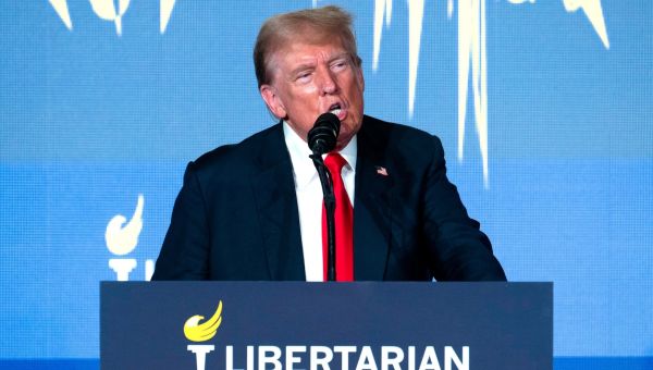 Trump met with boos asking Libertarians for nomination, votes at chaotic convention
