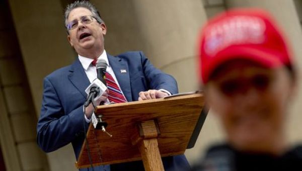 Michigan prosecutors charge Trump allies in felonies involving voting machines, illegal 'testing' - The Boston Globe
