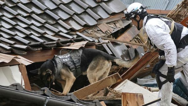 ‘Race against time’ in hunt for survivors after Japan earthquakes leave 62 dead