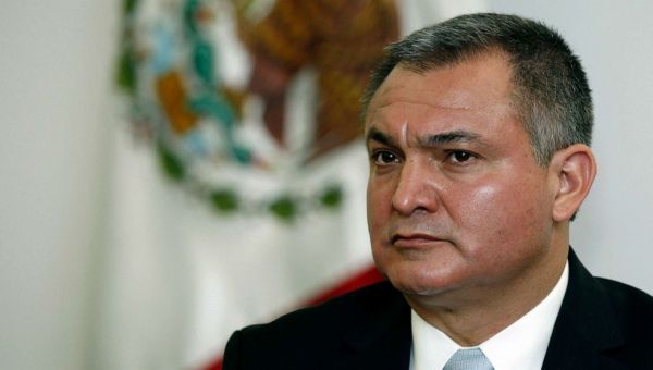 Mexico’s former top cop convicted of taking payoffs to shield drug cartels