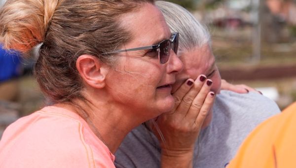 Helene’s death toll climbs to 52. Others left stranded, homeless, without power
