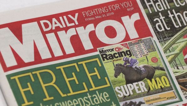 Mirror publisher told to pay some costs of phone hacking trial