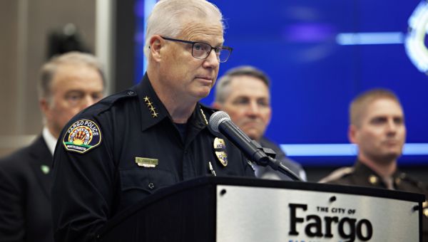 Man with thousands of bullets and a grenade attacked police, killing officer. What was his plan?