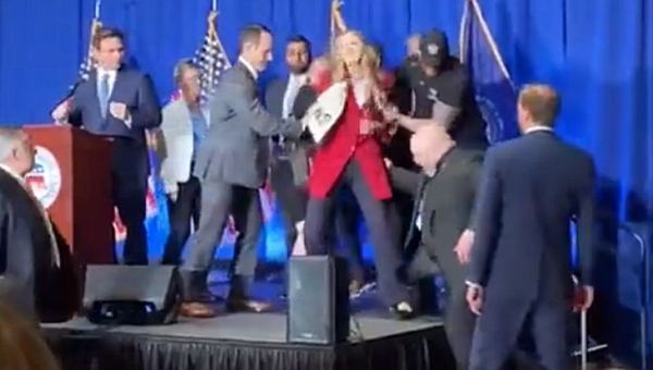 Two Women Rush the Stage at DeSantis Speech, Dragged off by Security