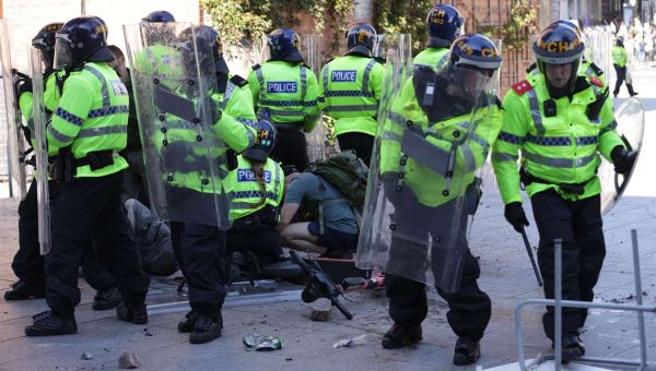 Violent protests see police officers injured as Prime Minister vows action