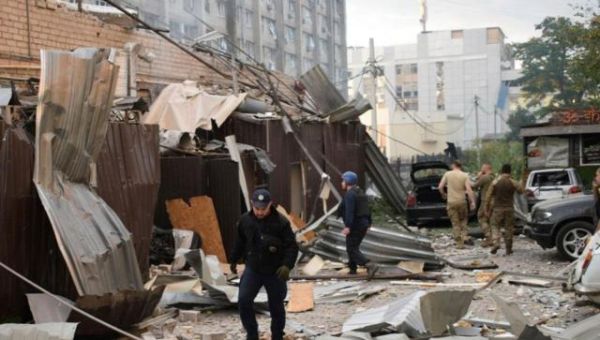 A missile kills 11 people in a Ukrainian pizza parlor as Russia’s aerial barrage continues