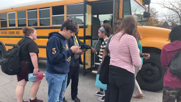 Gunman who killed 61-year-old woman and a 16-year-old girl at a St. Louis school brought a long gun and 12 magazines, police say