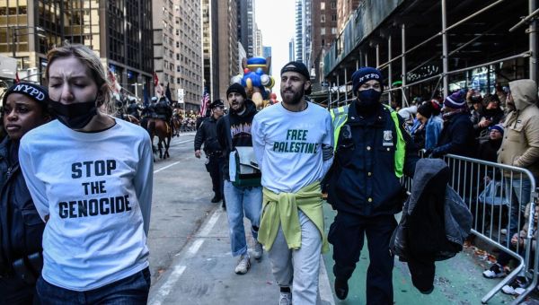 Pro-Palestinian protesters rally at Macy’s Thanksgiving parade as flag makes it to televised float