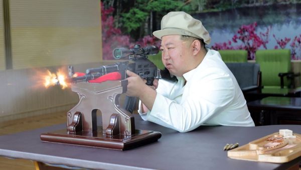 Kim Jong-un wears adorable train driver’s cap to fire massive sniper rifle