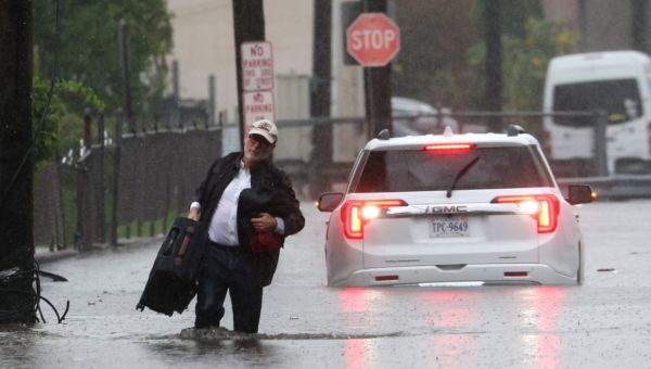 Torrential rain floods New York City streets and suspends subway service
