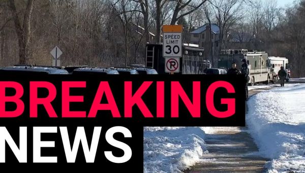 Police officers and paramedic shot dead after 911 call about weapons