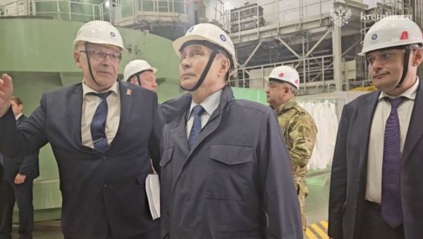 Putin shows no sign of agreeing to ceasefire with rare visit to the frontline