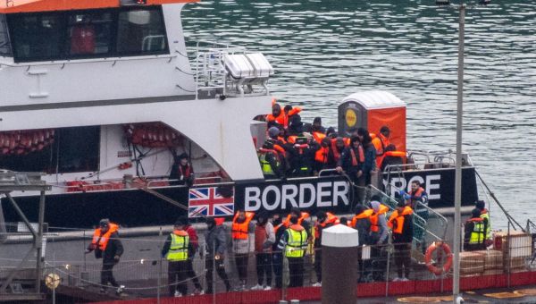 Britain plans new sanctions laws to target people-smuggling gangs