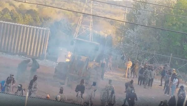 Dozens detained after a construction vehicle was set ablaze and bricks were thrown at the planned ‘Cop City’ police training site in Atlanta, authorit