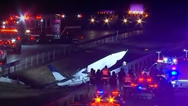One dead after small plane crashes onto highway