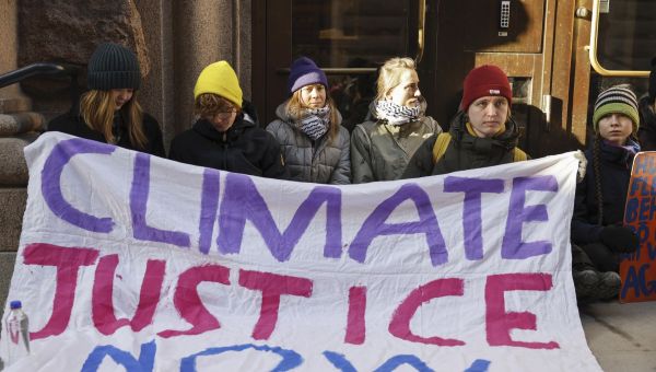Climate activists including Greta Thunberg block entrance to the Swedish Parliament