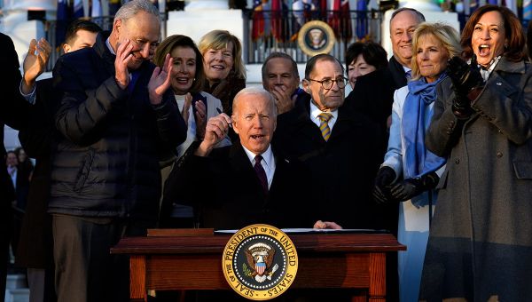 Biden signs same-sex marriage bill in musical White House ceremony
