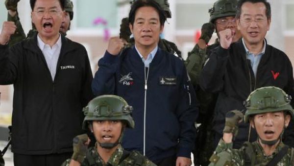 Taiwan’s Lai vows to show determination to fight as China looms