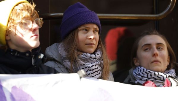 Climate activists including Greta Thunberg block entrance to Swedish parliament
