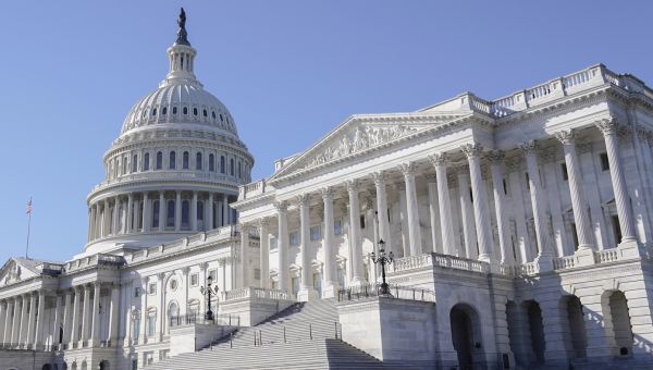 Congress avoids shutdown, setting up spending pileup for early next year