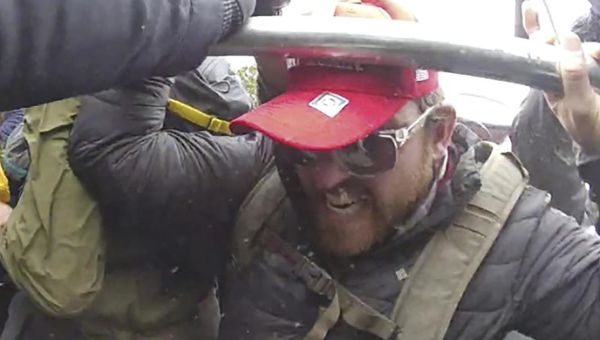 Man who used megaphone to lead attack on Capitol police sentenced to more than 7 years in prison