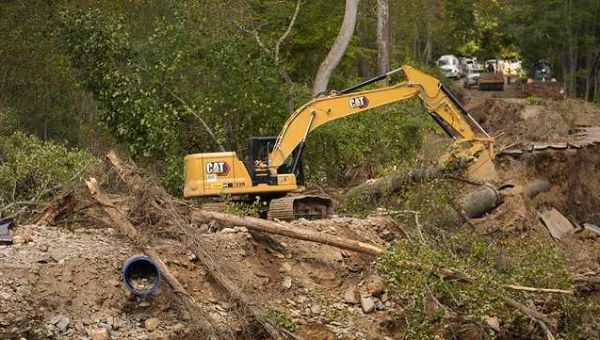 Folks in WNC stay in touch the old-fashioned way after Helene cuts roads, power, phones