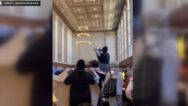 Columbia University safety officers clash with pro-Palestinian demonstrators occupying library room