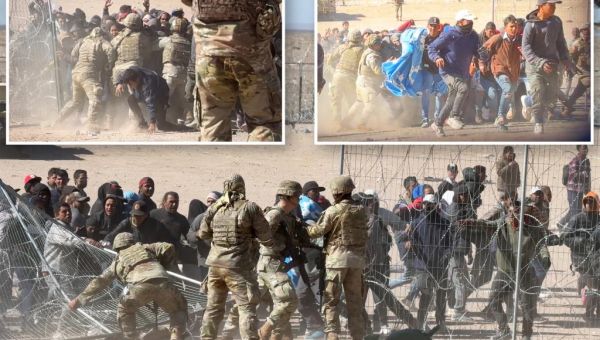 Migrants break barriers and rush border guards in shocking scene at...