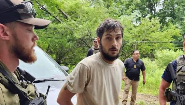 New photos show fugitive murder suspect Michael Burham during arrest ‘at gunpoint’