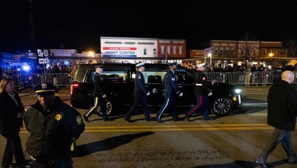 Fans Say Final Goodbye to Jimmy Carter as Motorcade Brings Him to Hometown Burial Site