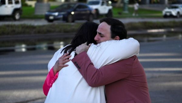 A woman entered a Houston megachurch with a child and began shooting. Here’s what we know