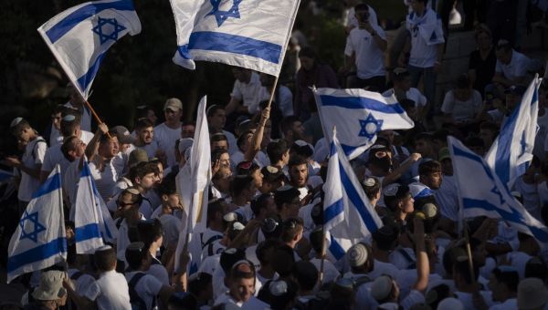 Israel’s far right uses Flag Day to push for expansion of war