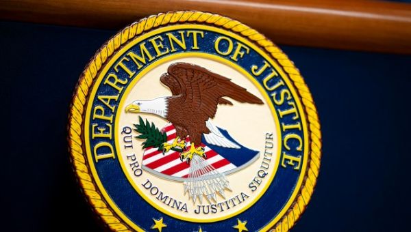 Ex-Trump adviser indicted in Russia crackdown