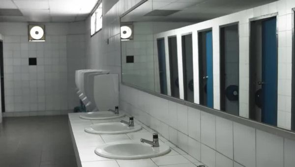 Gov. Mike DeWine signs the bill limiting bathroom use by trans people at Ohio’s schools and colleges