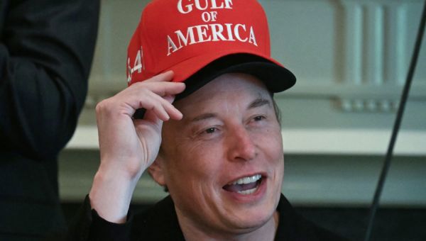 Elon Wears Two Hats During Trump Meeting in Desperate Bid for Attention