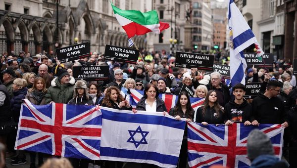 Thousands march against antisemitism in London as Tommy Robinson arrested – live