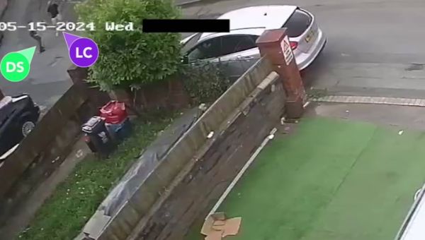 The moment murderer sprints down quiet street with Rambo-style knife in broad daylight