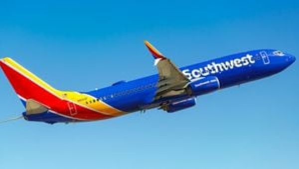 Officials: Man jumps out of emergency exit onto wing of Southwest Airlines plane headed to Atlanta