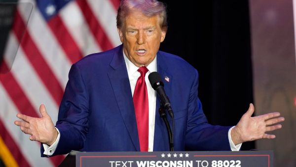 Trump says Harris was born ‘mentally impaired’ and spends much of rambling rally speech insulting her