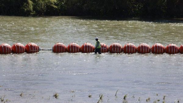 Texas plans appeal as federal judge orders floating barrier moved in Rio Grande