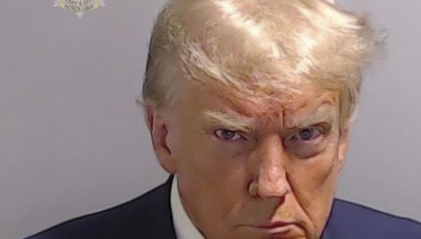 Opinion: Readers are tired of Trump photos. But what happens when his mug shot is the story?