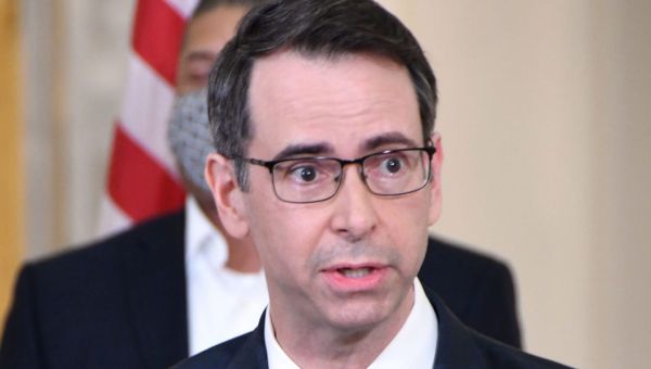 An ex-aide to former GOP Gov. Larry Hogan was shot dead in a confrontation with the FBI after a 3-week manhunt on fraud charges