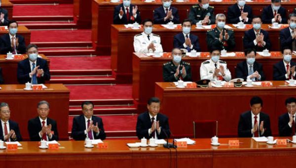 Former Chinese leader Hu Jintao unexpectedly led out of room as Communist Party Congress comes to a close