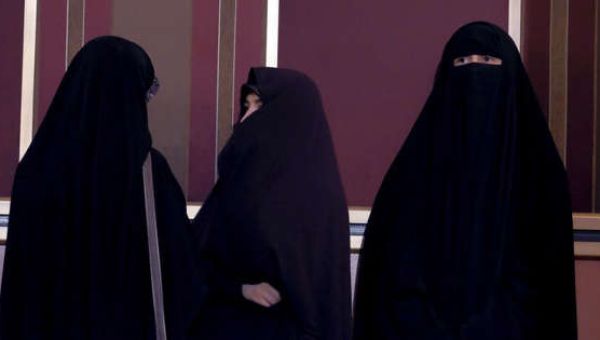 Raisi says hijab is the law in Iran as unveiled women face ‘yoghurt attack’