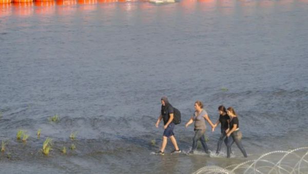 Texas' floating barrier in the Rio Grande can stay for now, appeals court says