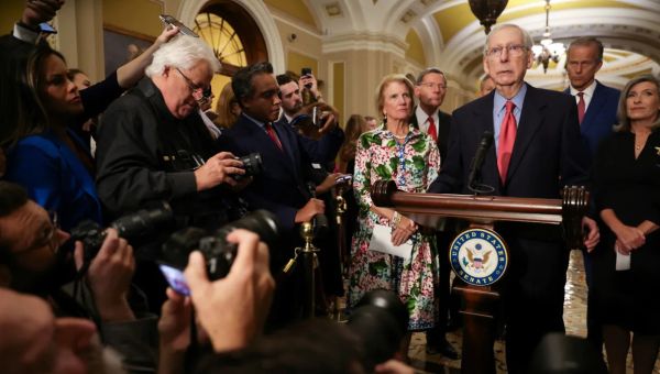 McConnell responds to questions after two instances of freezing mid-sentence at public events