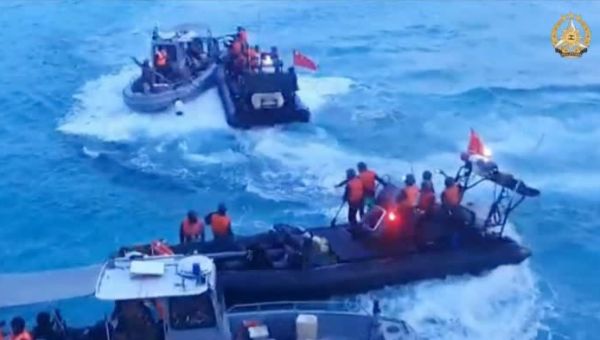 Beijing and Manila hold talks to defuse South China Sea tensions