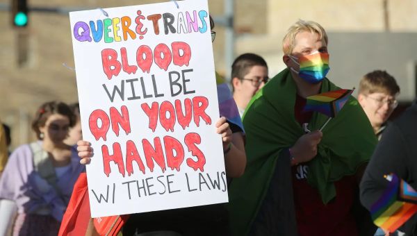 ‘I am what they’re scared of’: Transgender youths rally at Kansas Statehouse