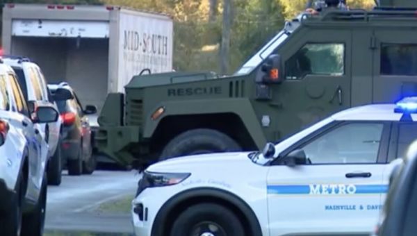 Police chief’s son suspected of shooting 2 officers, manhunt underway